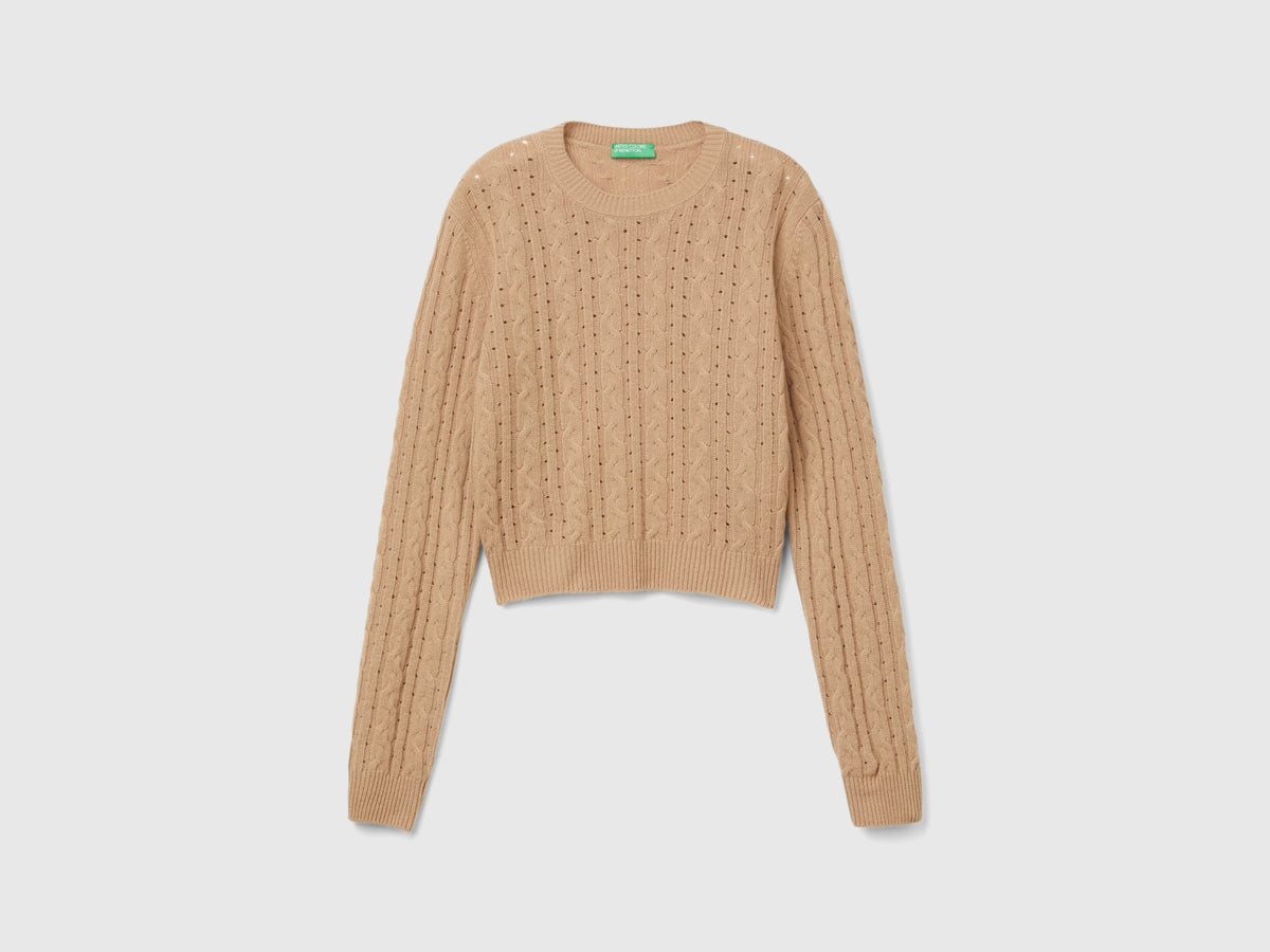 Maglia cropped con trecce e trafori