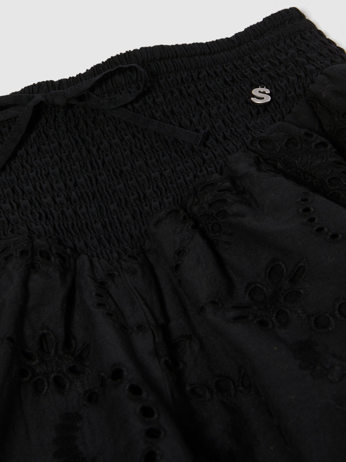 Shorts ricamati