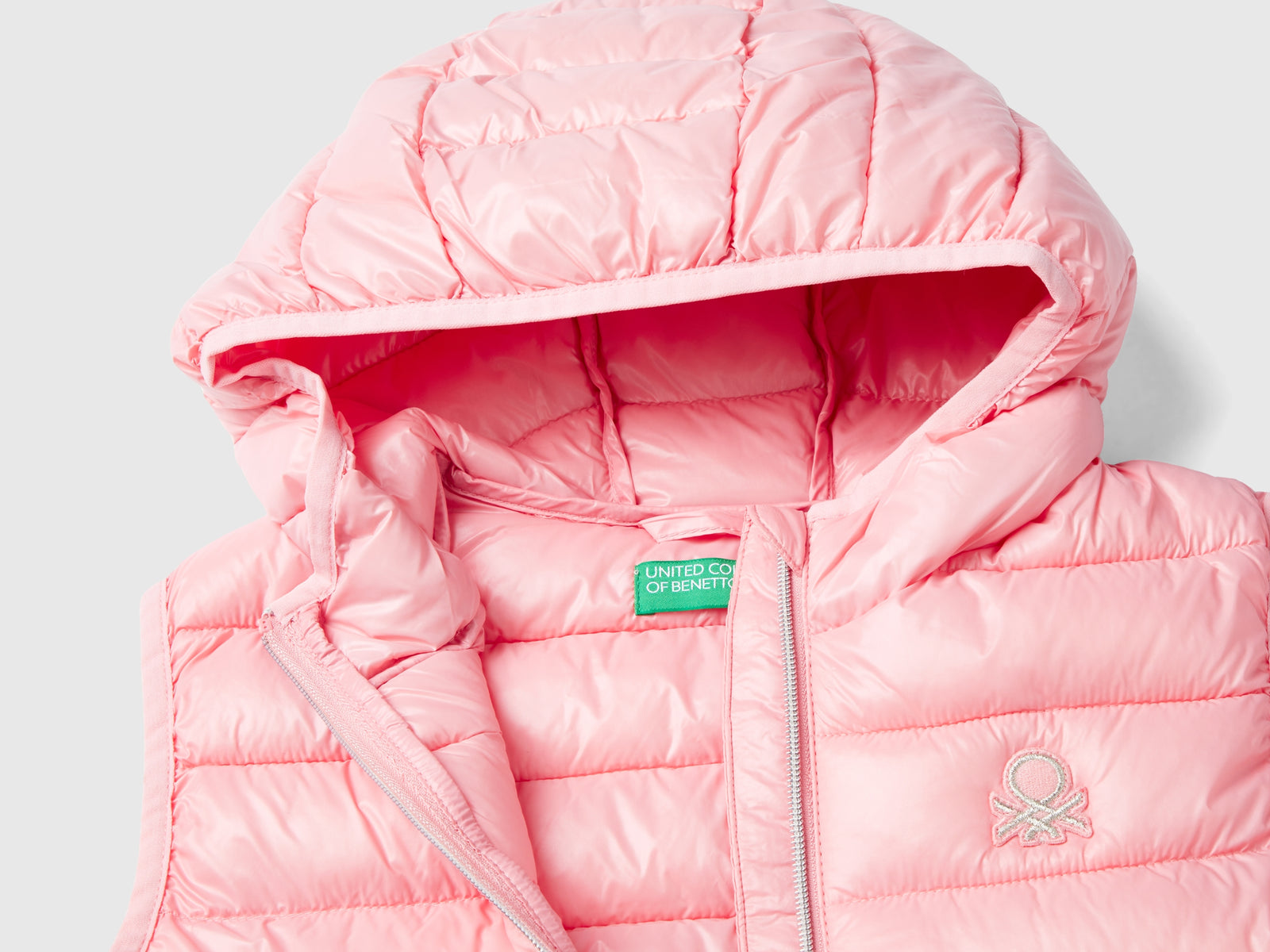 Gilet imbottito con cappuccio da bambina rosa 3 | Benetton Outlet