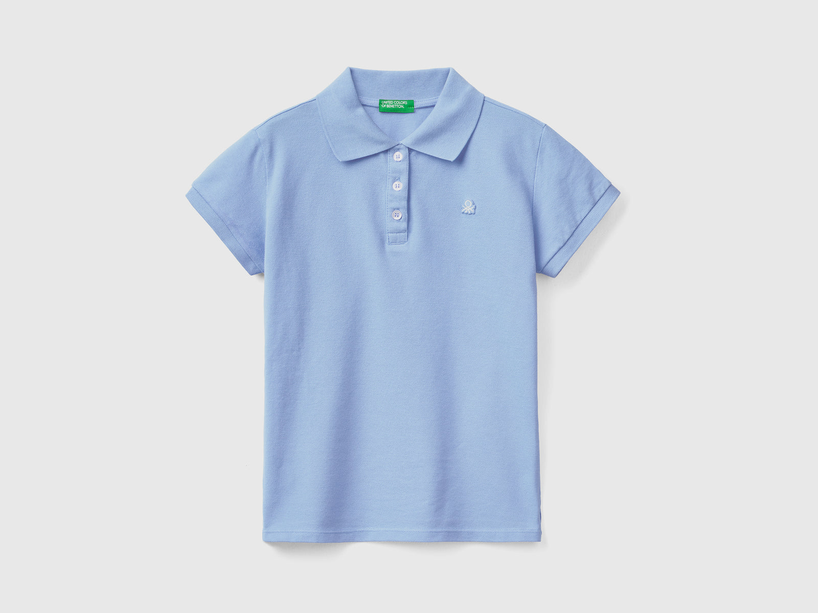 Polo a manica corta in piquet di cotone elasticizzato da bambina pervinca | Benetton Outlet