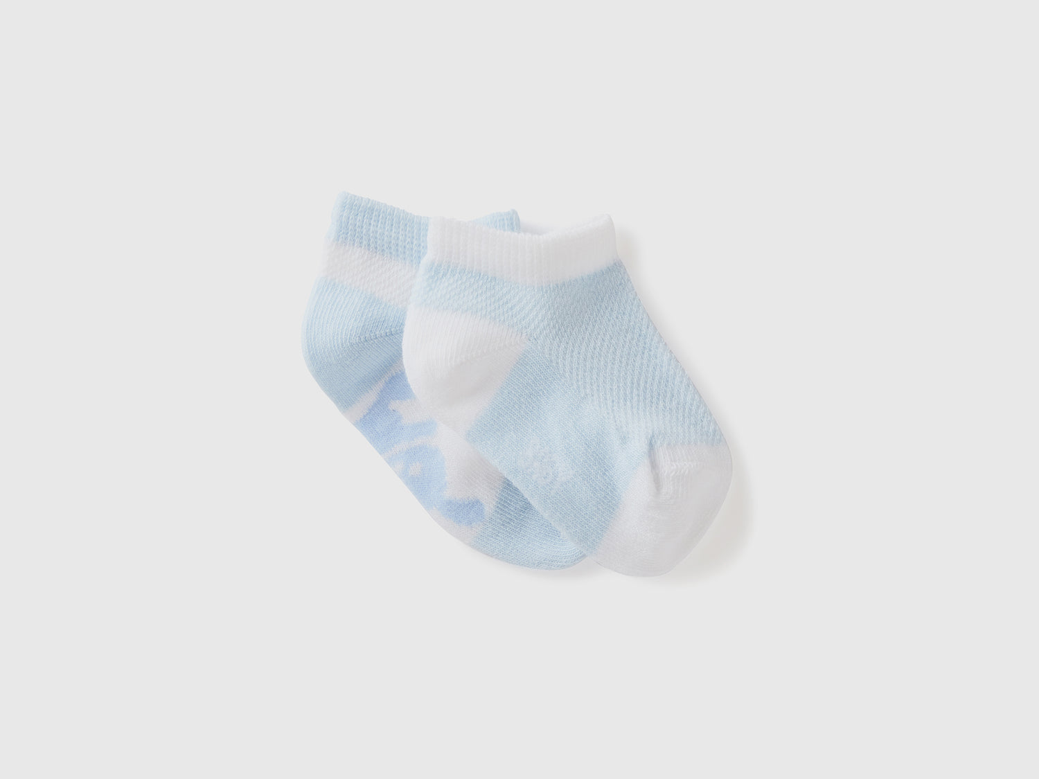 Due paia di calzini in spugna da neonato celeste | Benetton Outlet