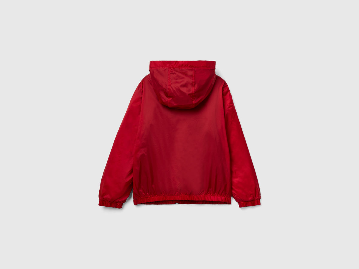 Giubbino in nylon con zip e cappuccio