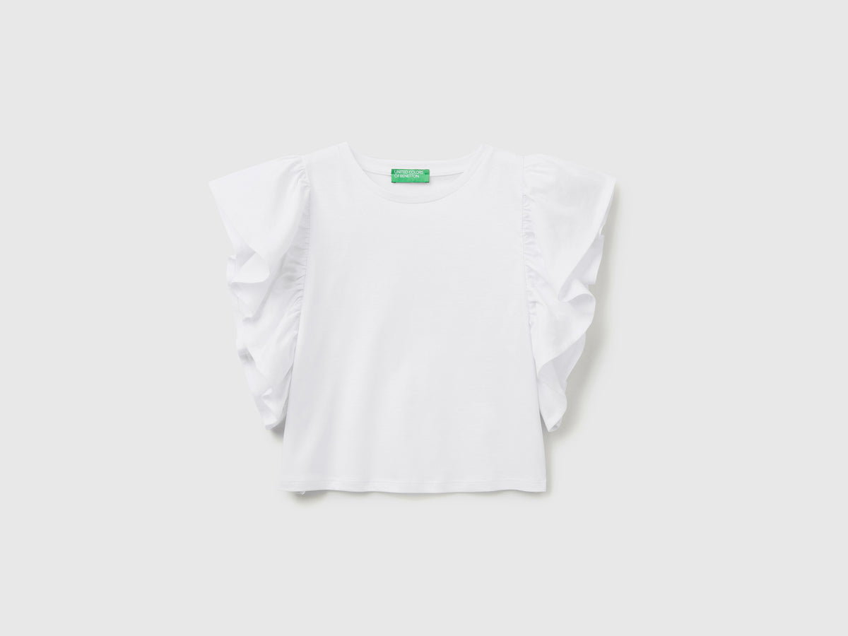 T-shirt smanicata in puro cotone con ampi volant applicati sul giromanica