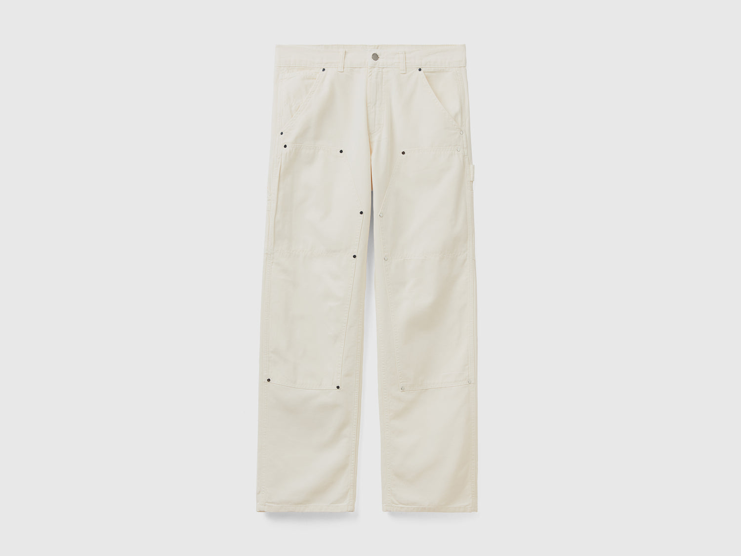 Pantaloni lunghi in puro cotone tinto in capo con impunture a contrasto da uomo bianco panna | Benetton Outlet
