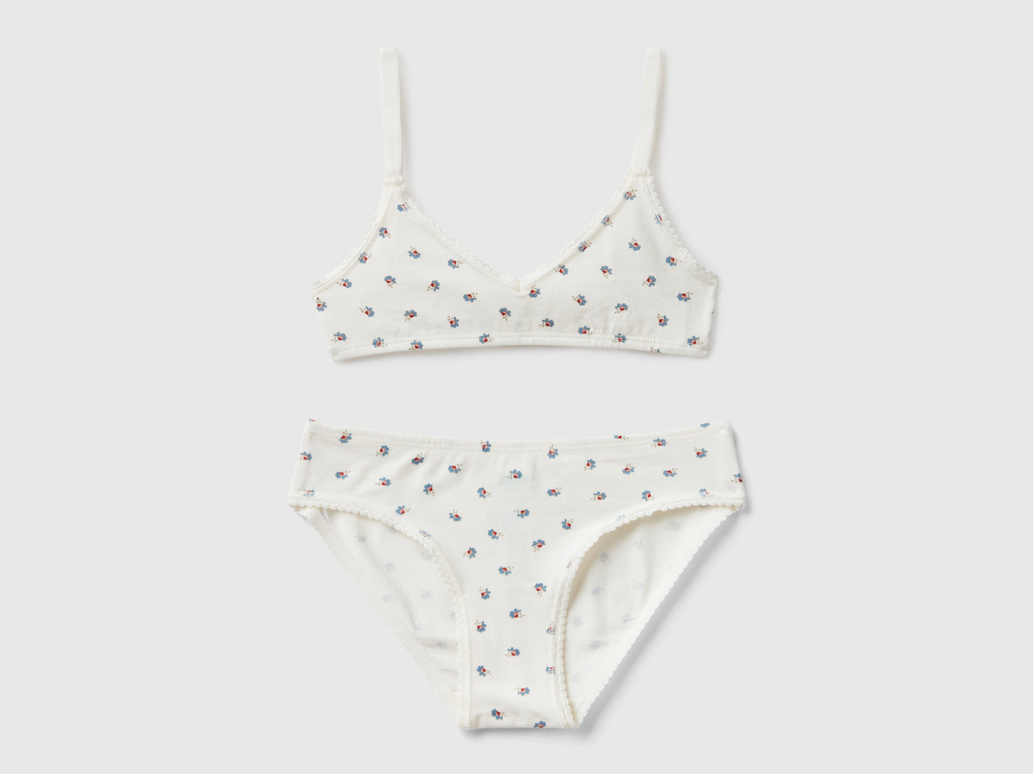 Completino top e slip fantasia da bambina bianco panna | Benetton Outlet