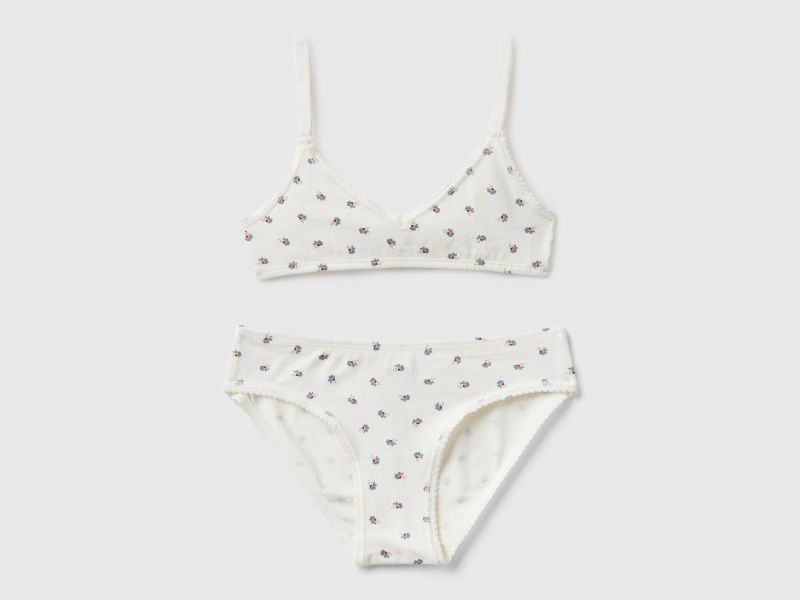 Completino top e slip fantasia da bambina bianco panna | Benetton Outlet