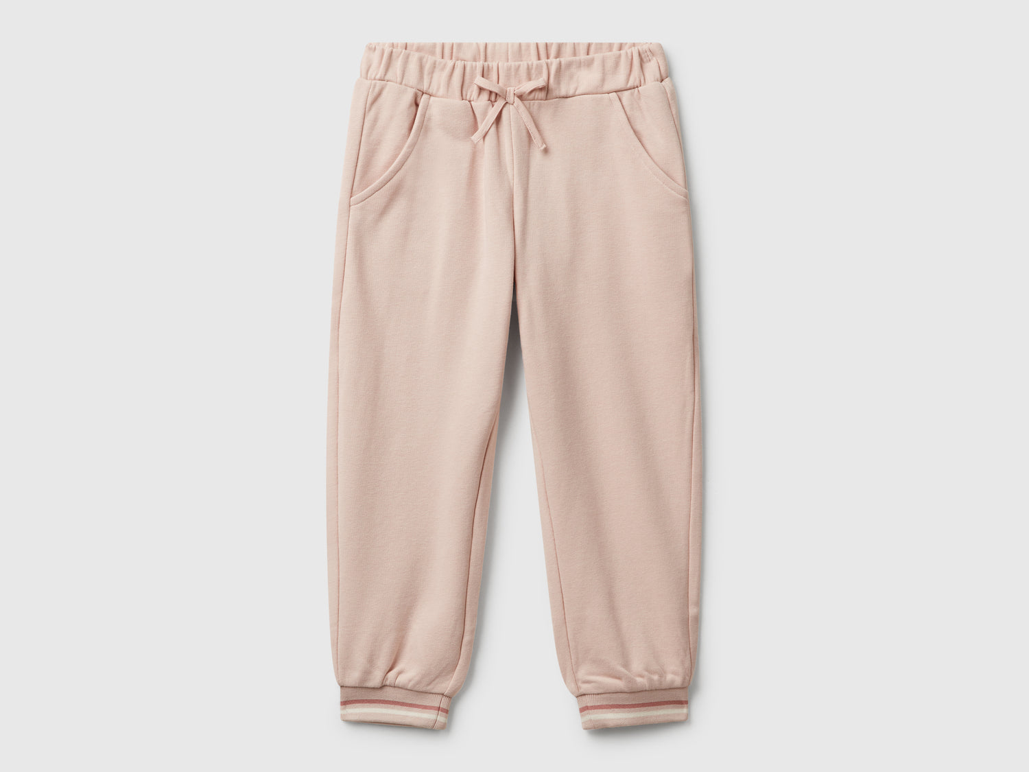Joggers con fiocco da bimba rosa tenue | Benetton Outlet