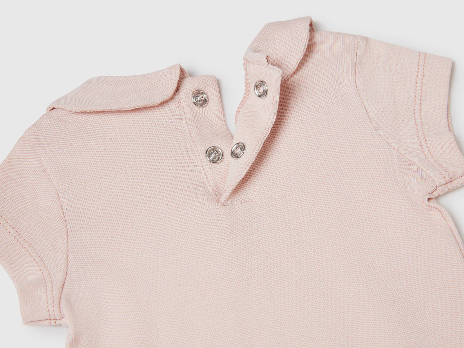 Body in costina di puro cotone da neonato rosa tenue 2 | Benetton Outlet