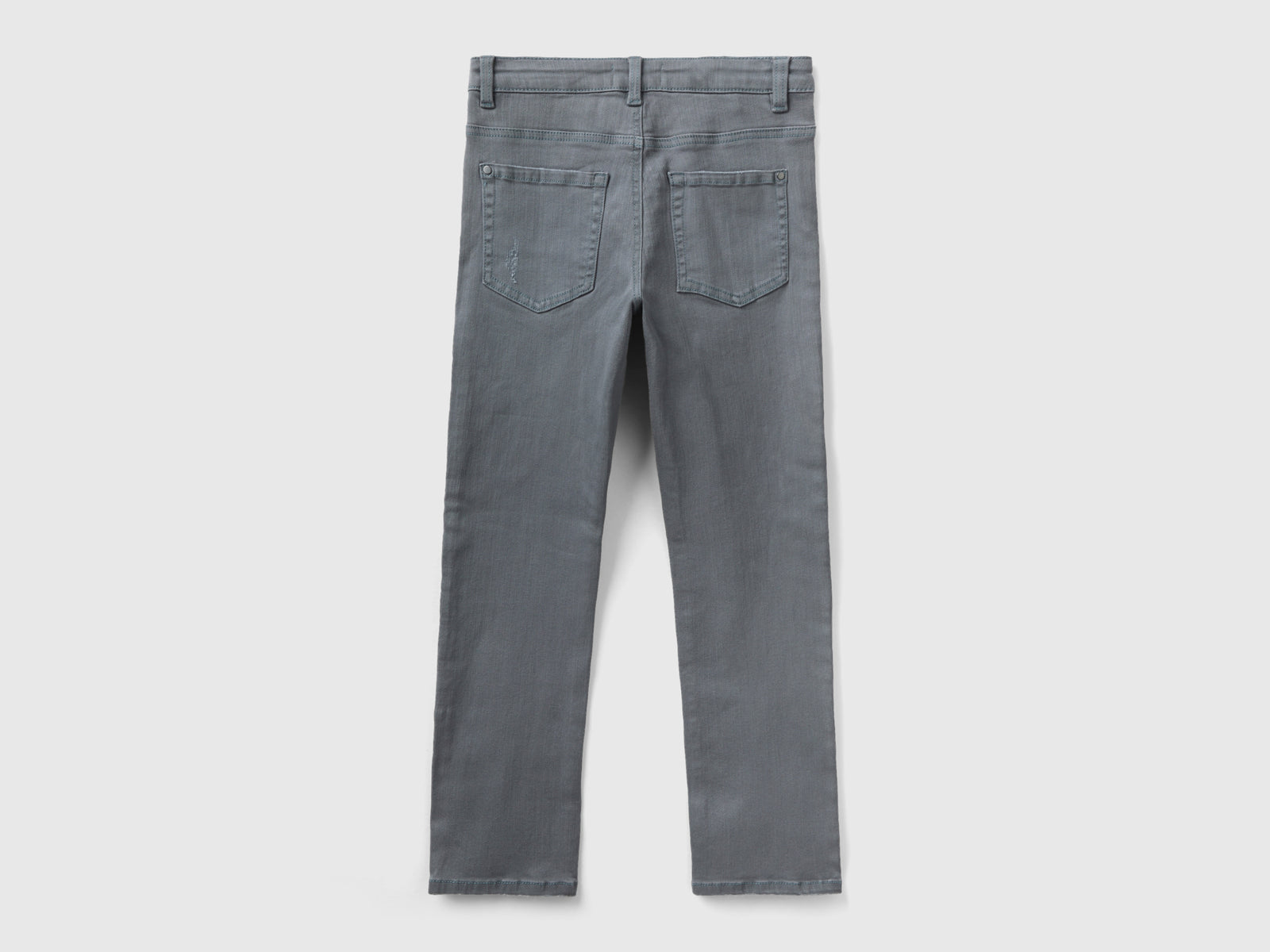 Jeans stretch con rotture da bambino grigio scuro 2 | Benetton Outlet