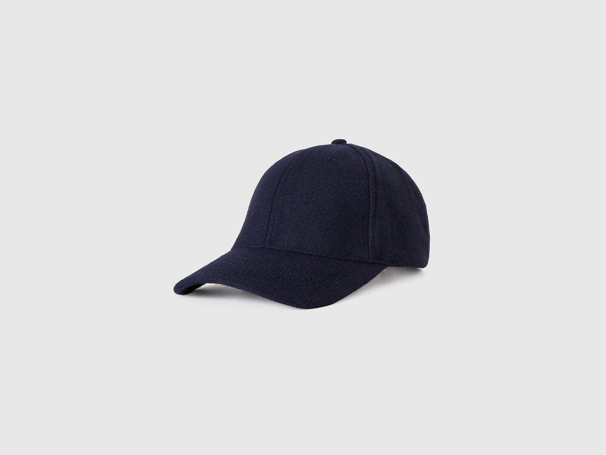 Cappello con visiera in panno