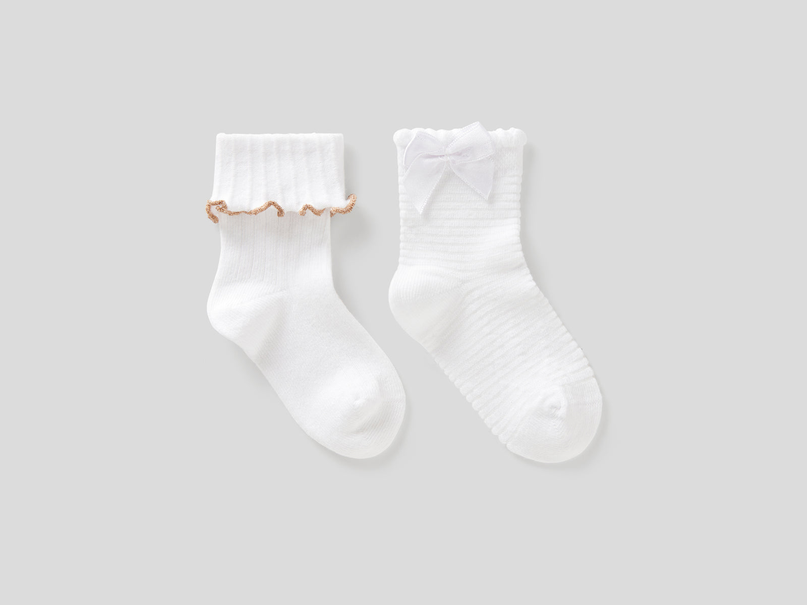 Due calzini in misto cotone stretch da neonato bianco | Benetton Outlet