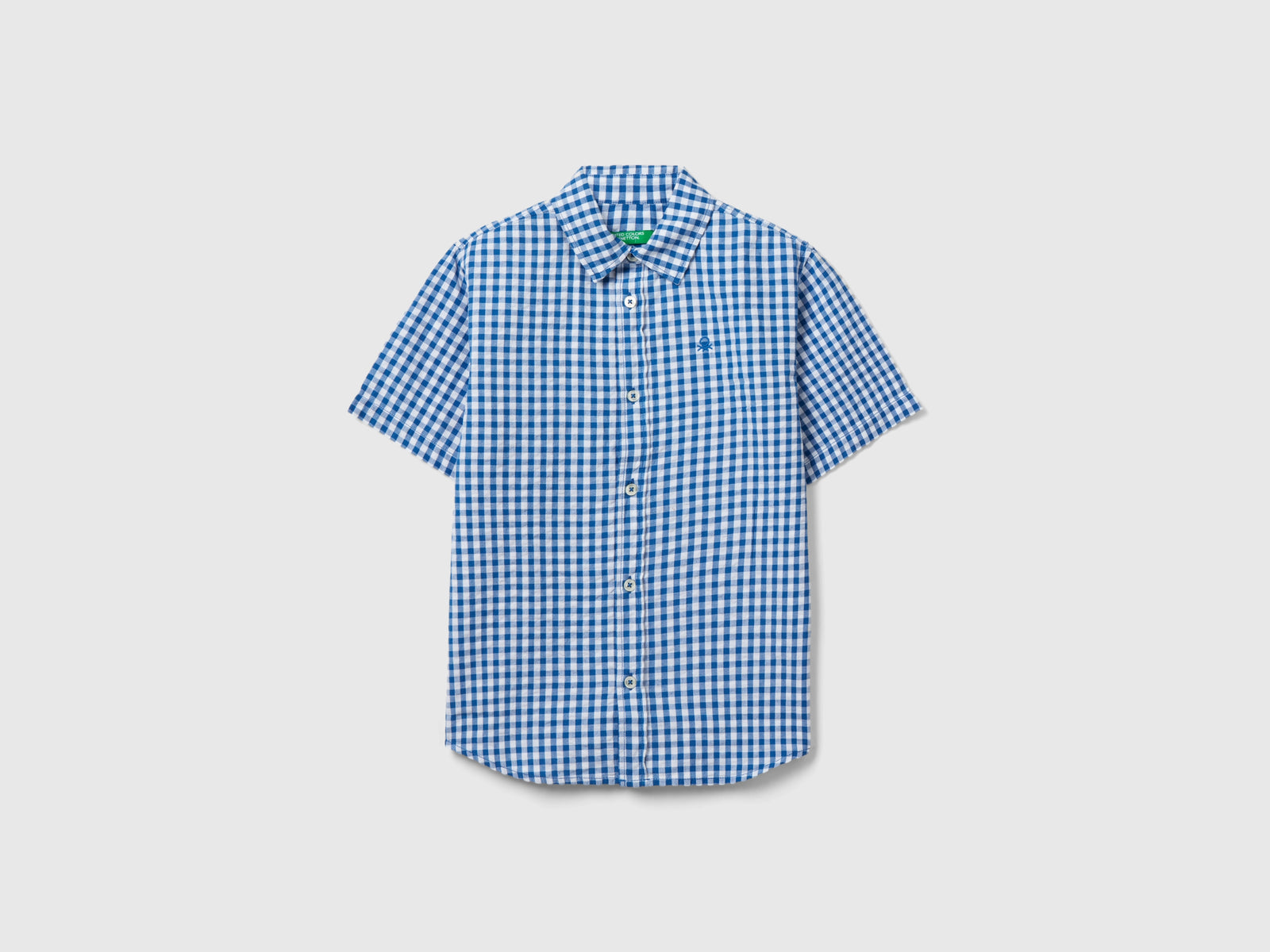 Camicia manica corta a quadretti da bambino blu | Benetton Outlet
