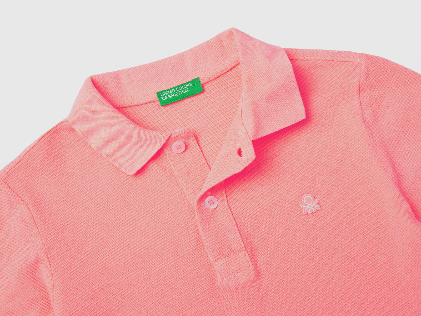 Polo fluo in cotone biologico da bambino rosa fluo 2 | Benetton Outlet