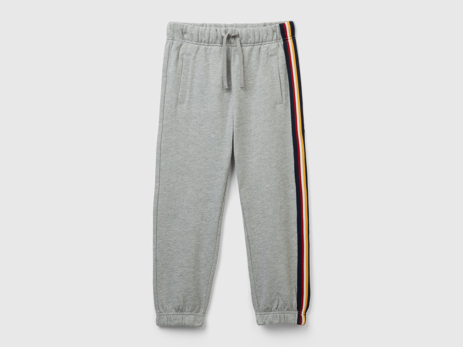 Joggers in felpa con banda rigata da bambino grigio chiaro | Benetton Outlet
