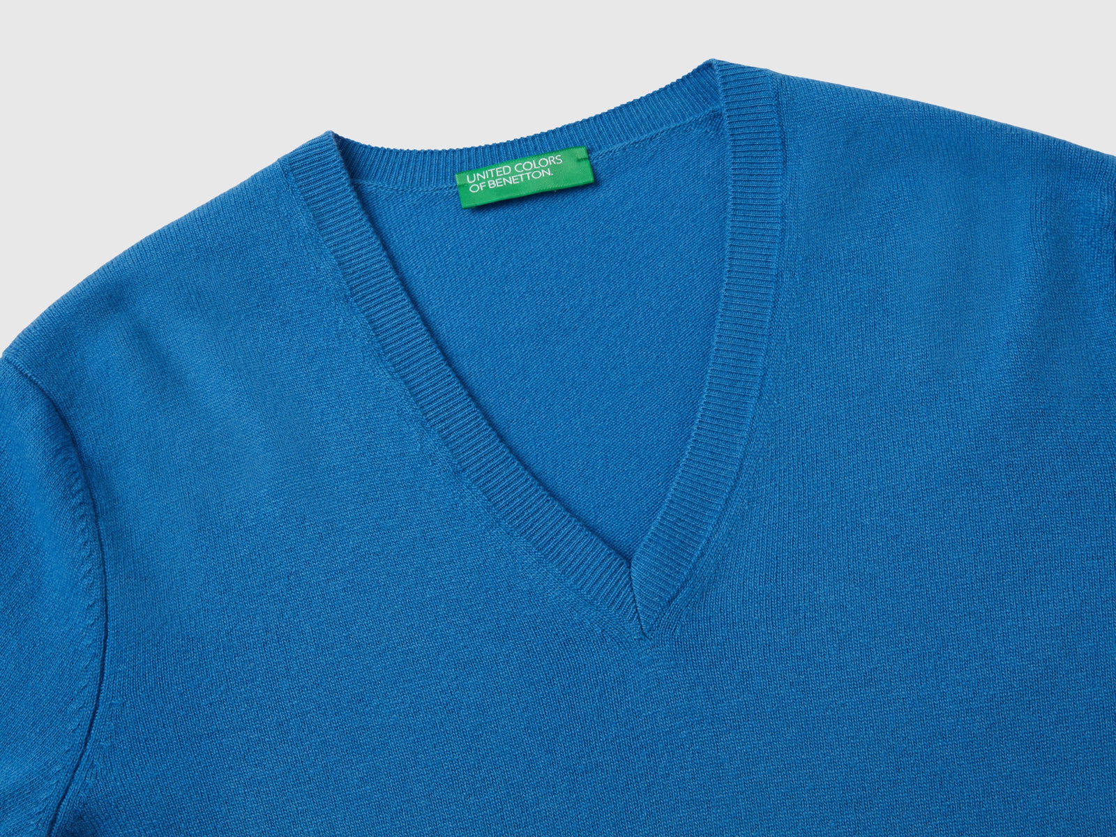 Maglia con scollo a V in pura lana Merino da donna blu 3 | Benetton Outlet