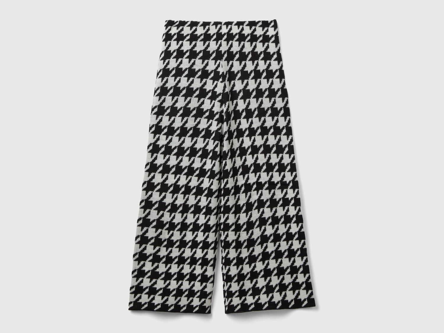 Pantaloni in maglia pied de poule da bambina nero | Benetton Outlet