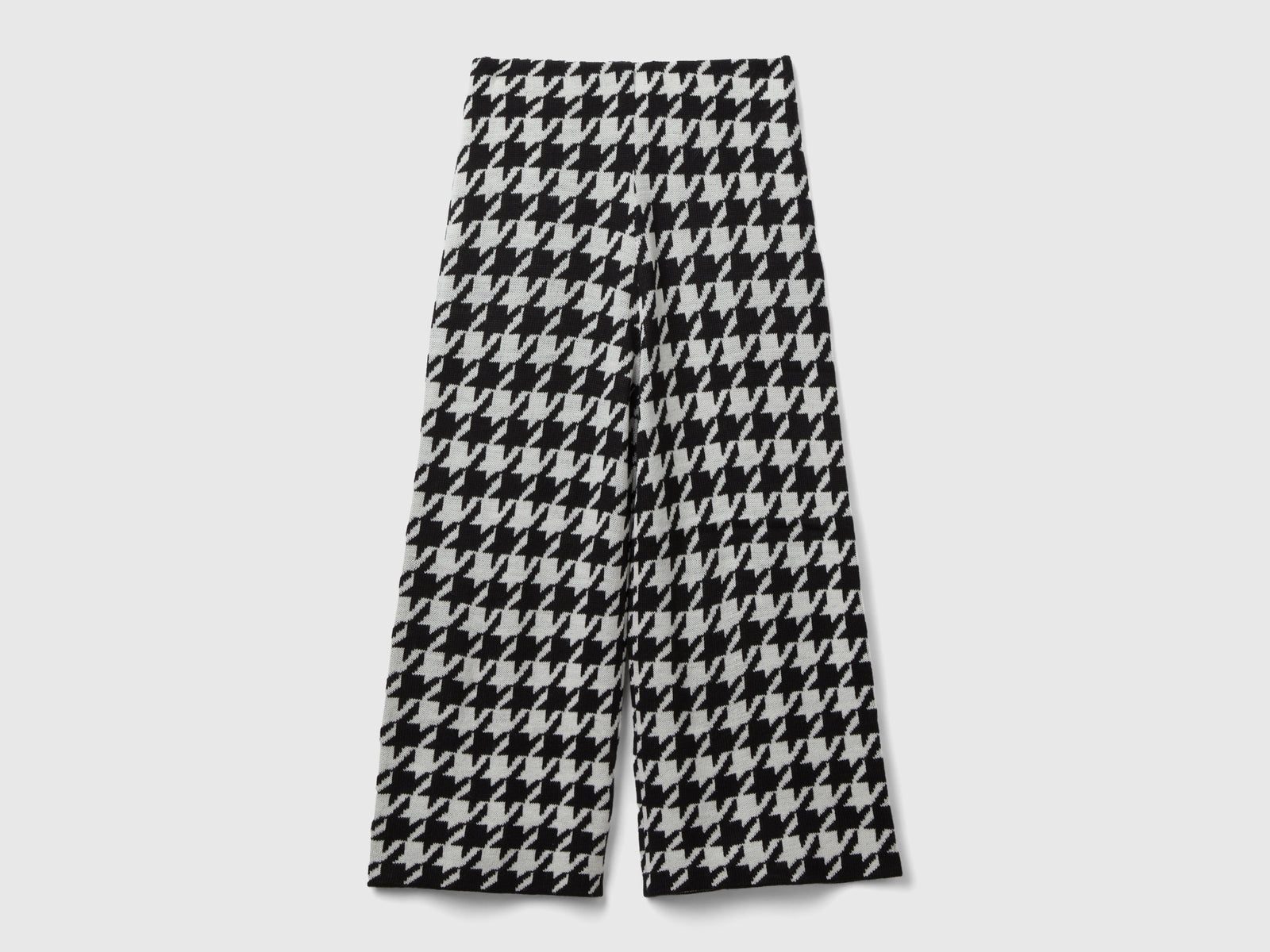 Pantaloni in maglia pied de poule da bambina nero | Benetton Outlet