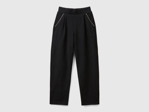 Pantaloni con applicazione effetto gioiello