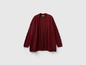 Cardigan con trecce e losanghe