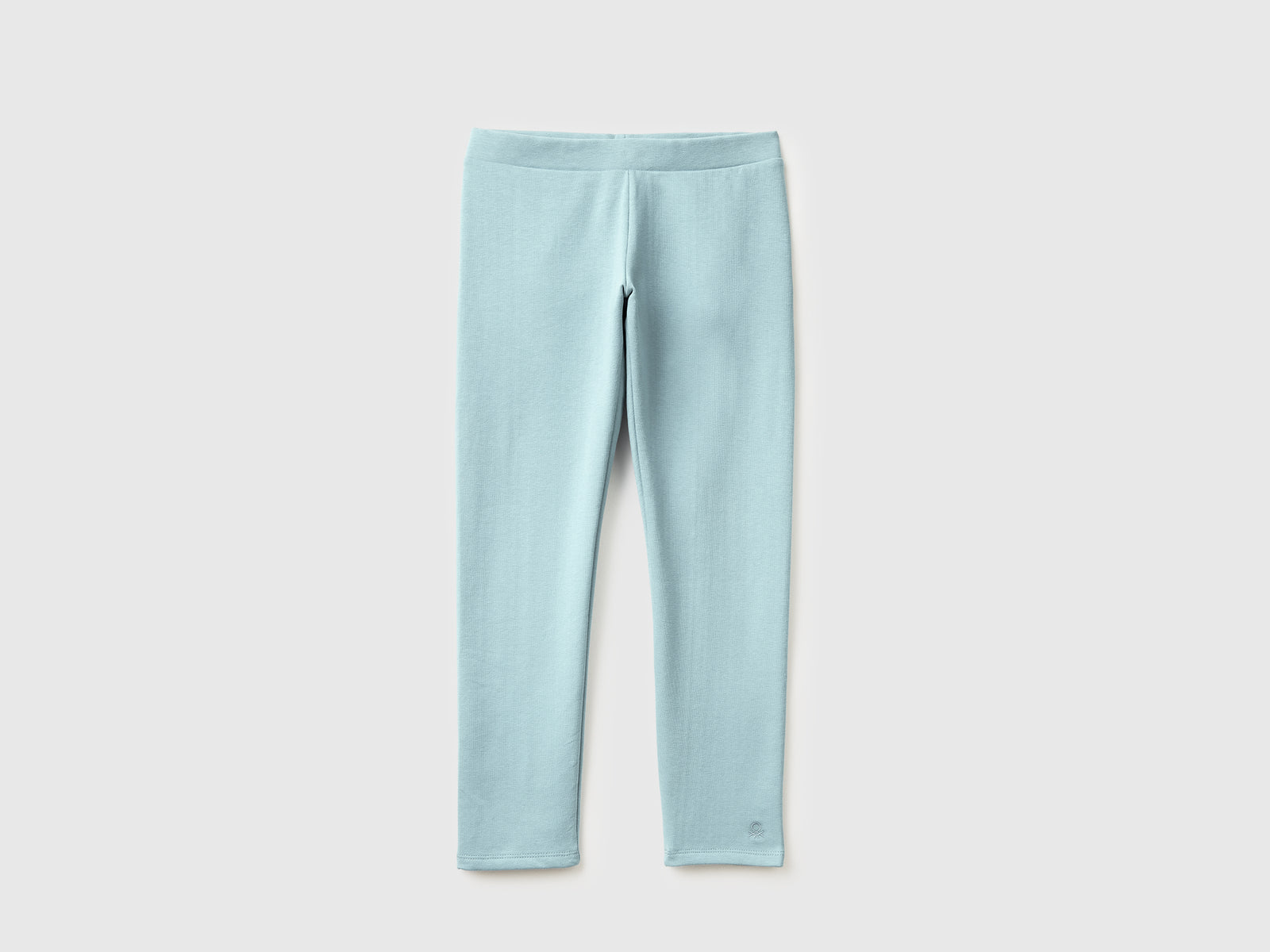 Caldi leggings felpati da bambina verde acqua | Benetton Outlet
