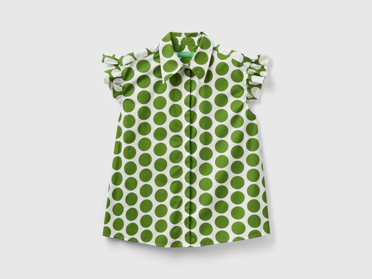 Camicia smanicata a pois