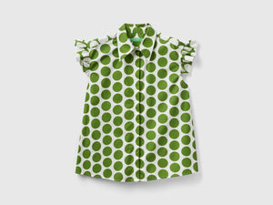 Camicia smanicata a pois