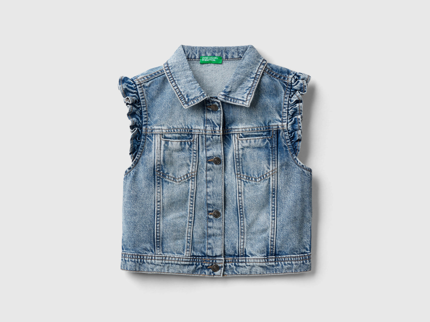 Gilet di jeans con volant da bambina azzurro | Benetton Outlet