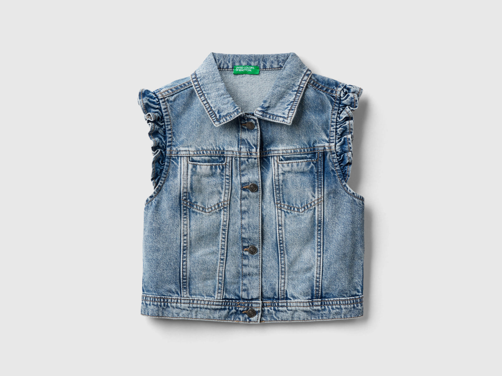Gilet di jeans con volant da bambina azzurro | Benetton Outlet