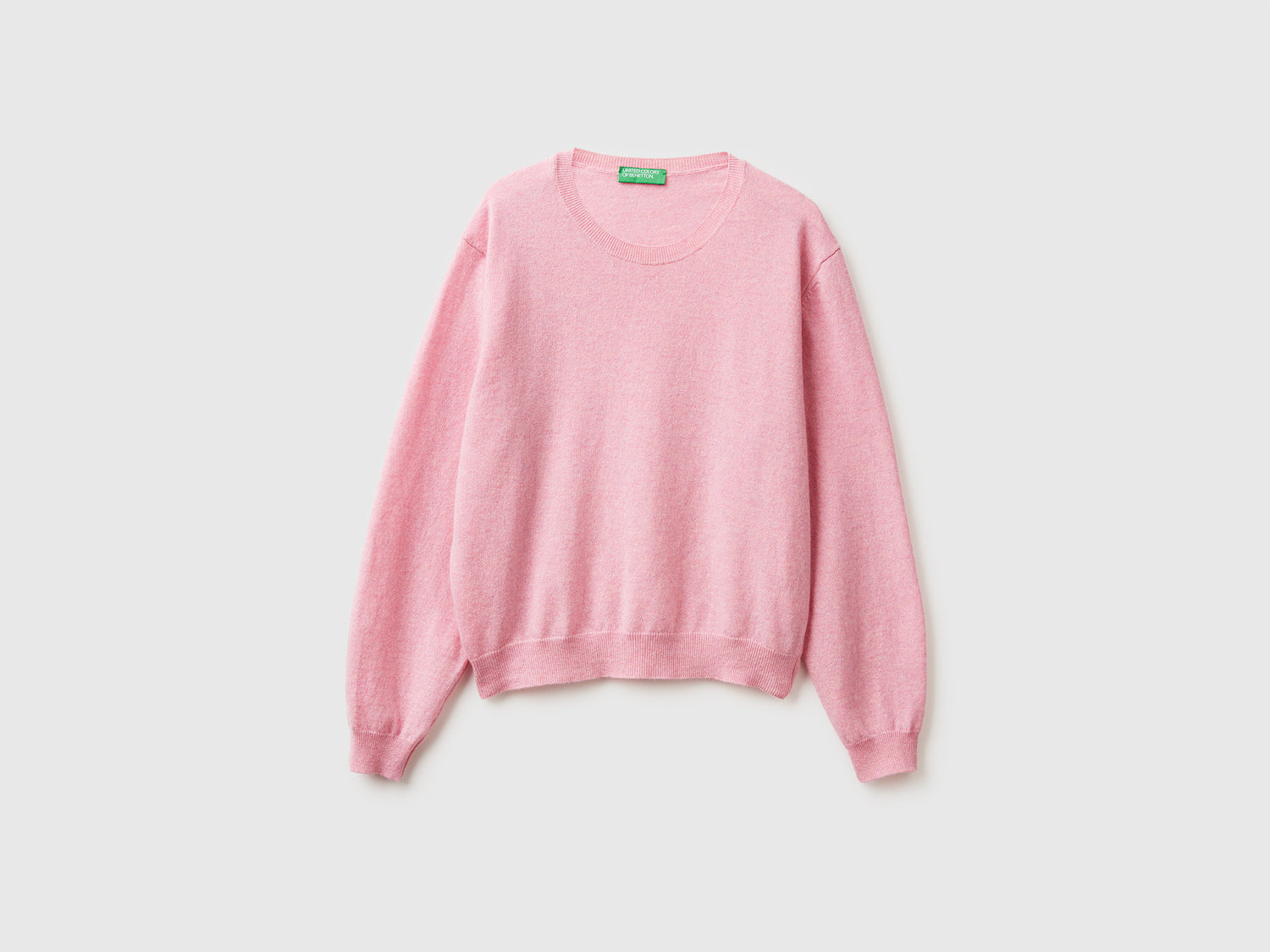 Maglia relaxed fit in pura lana Merino da donna rosa | Benetton Outlet