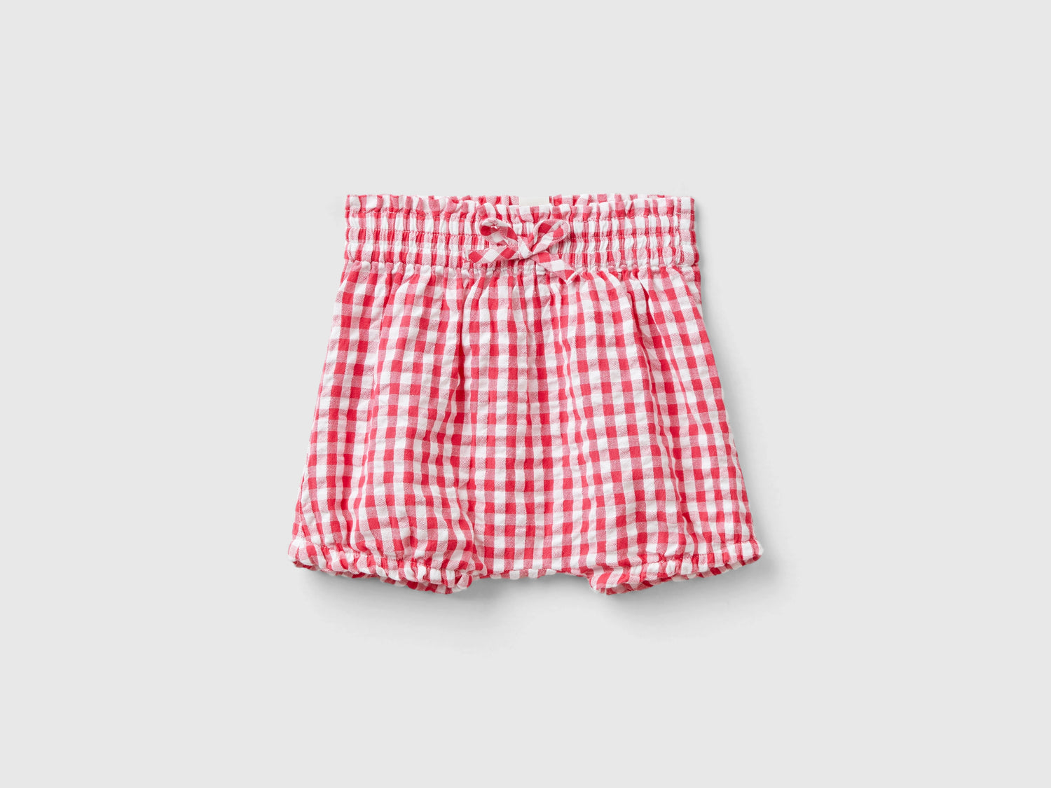 Pantaloni corti vichy da neonato fucsia | Benetton Outlet