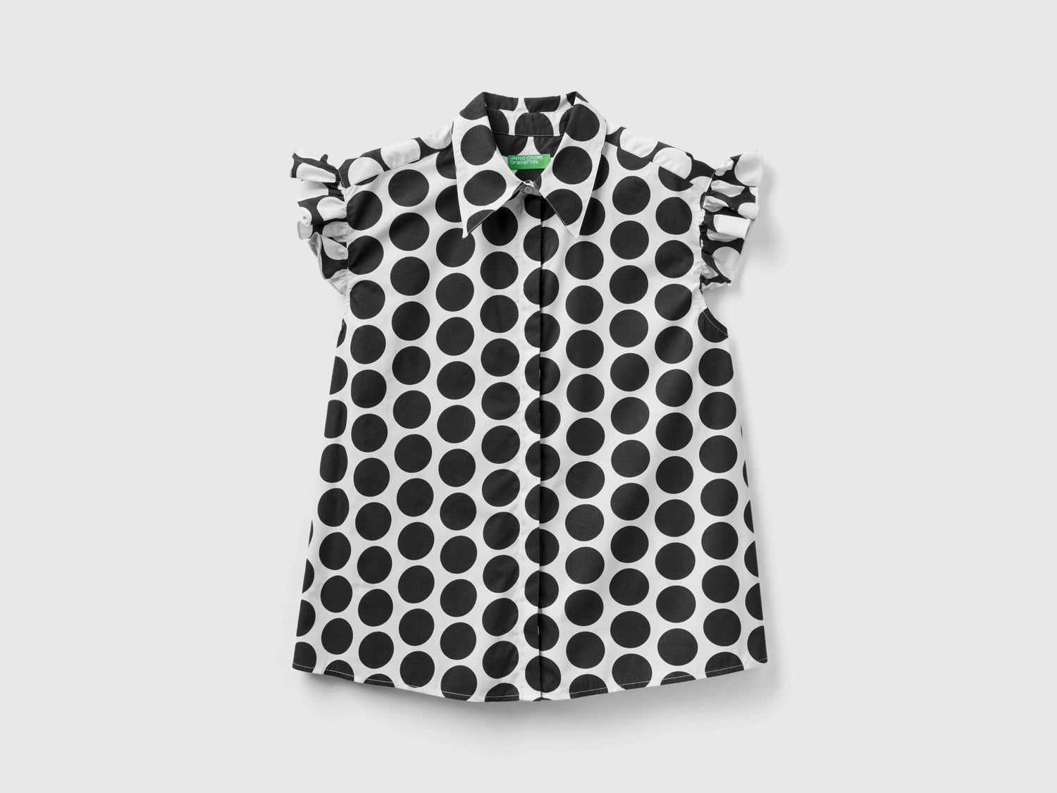 Camicia smanicata a pois da donna nero | Benetton Outlet