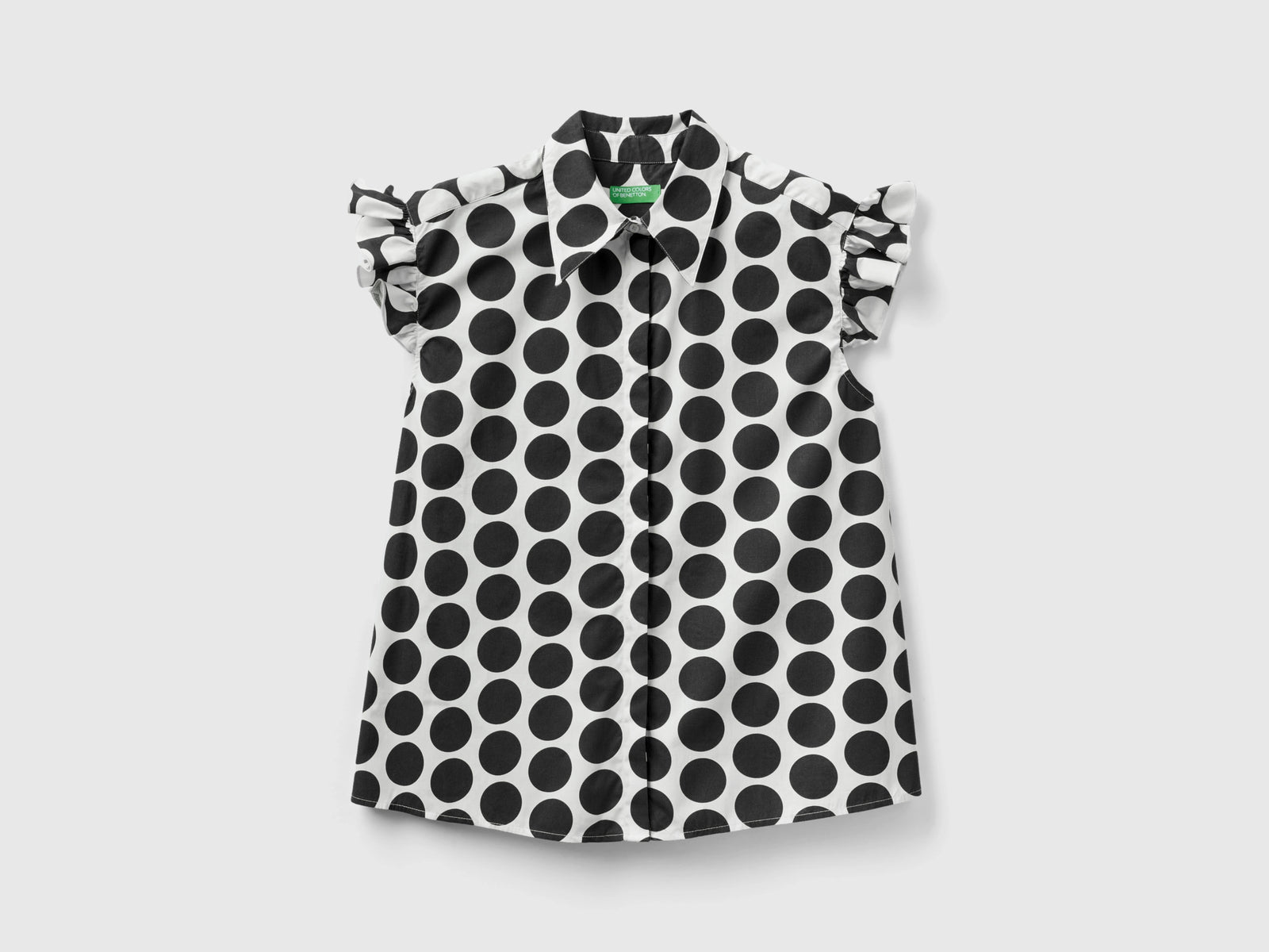 Camicia smanicata a pois da donna nero | Benetton Outlet