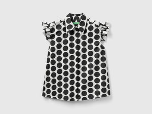 Camicia smanicata a pois