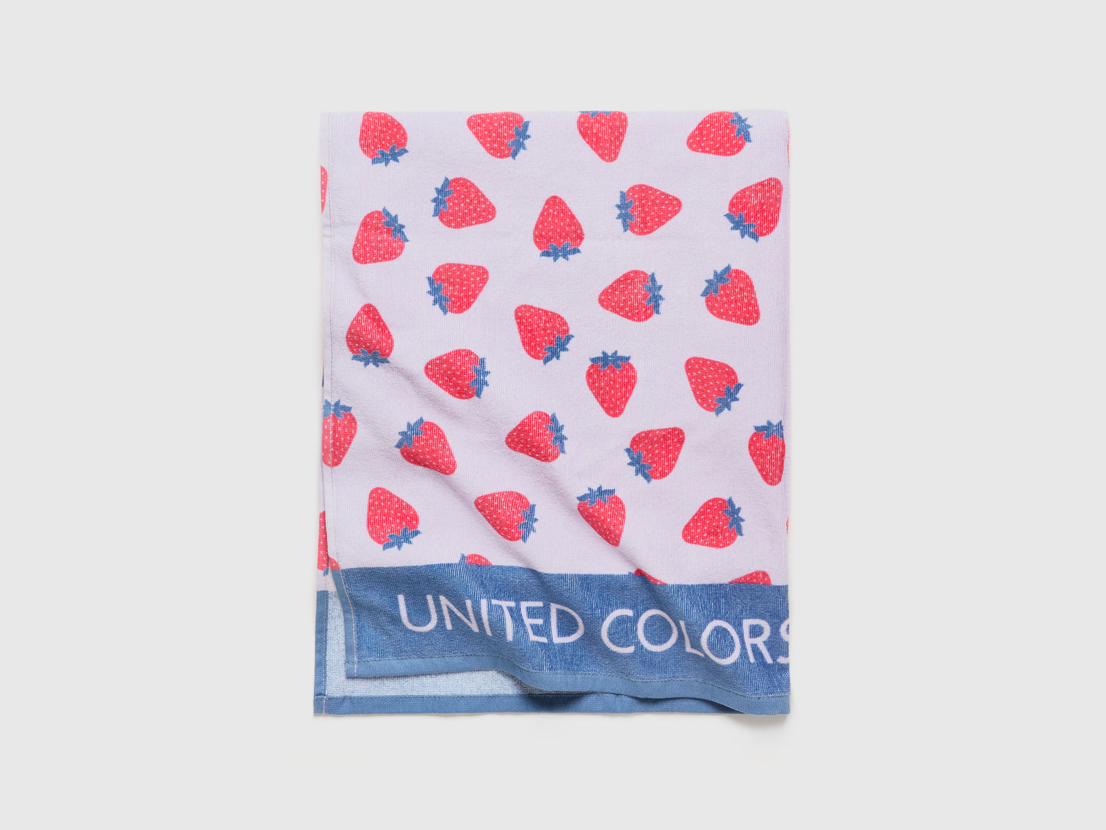 Telo mare con pattern fragole da bambino lilla 3 | Benetton Outlet