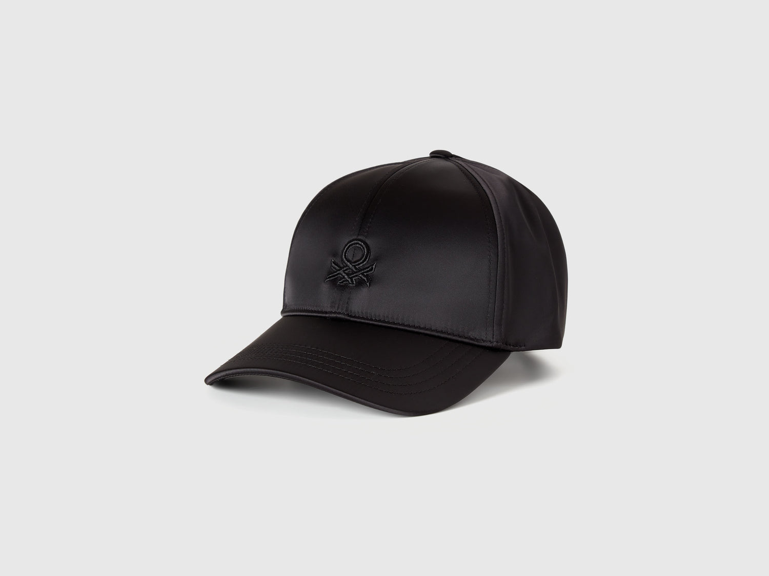 Cappello baseball effetto satin da donna nero | Benetton Outlet