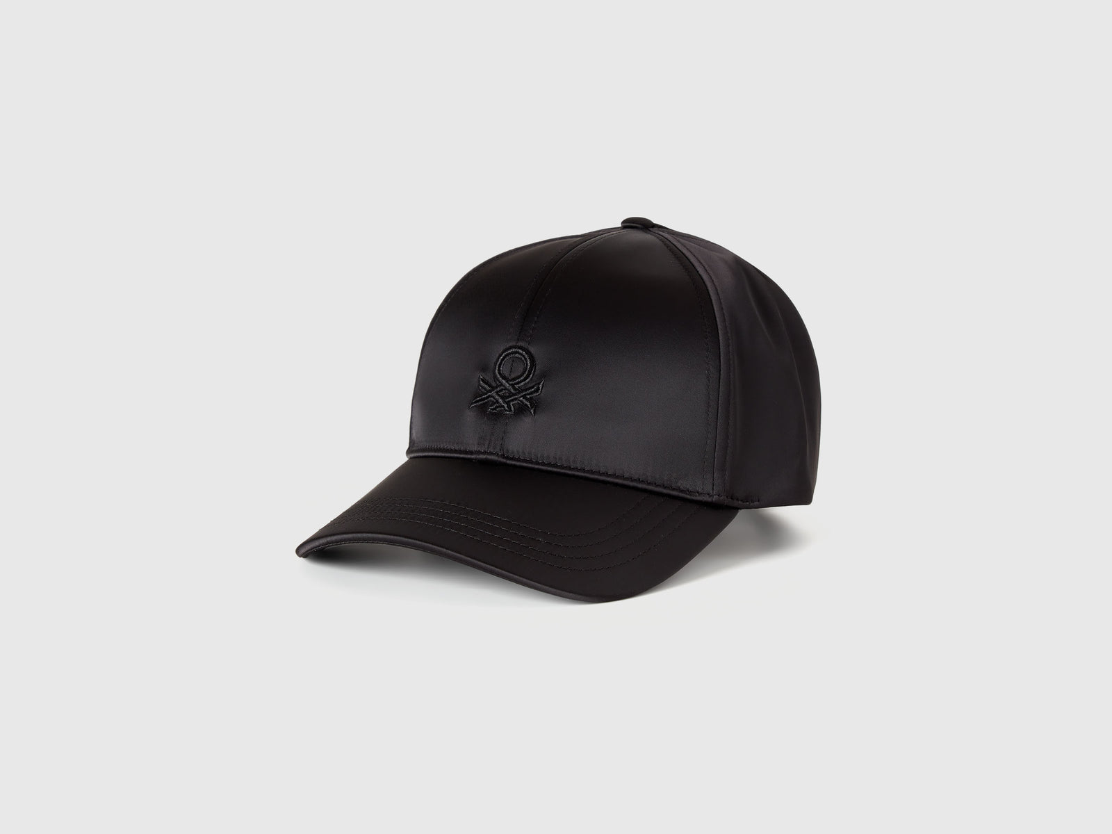 Cappello baseball effetto satin da donna nero | Benetton Outlet