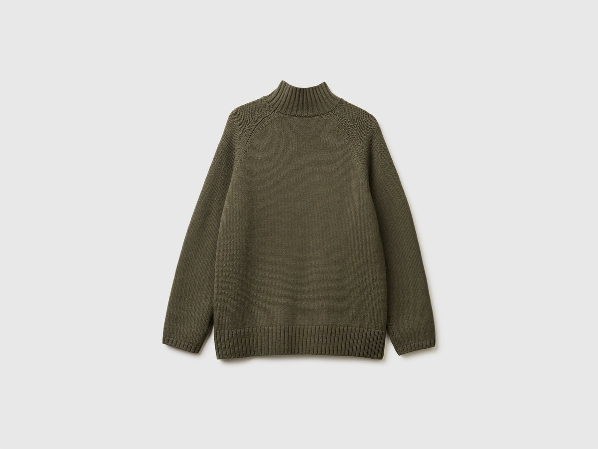 Maglione dolcevita over fit con frange