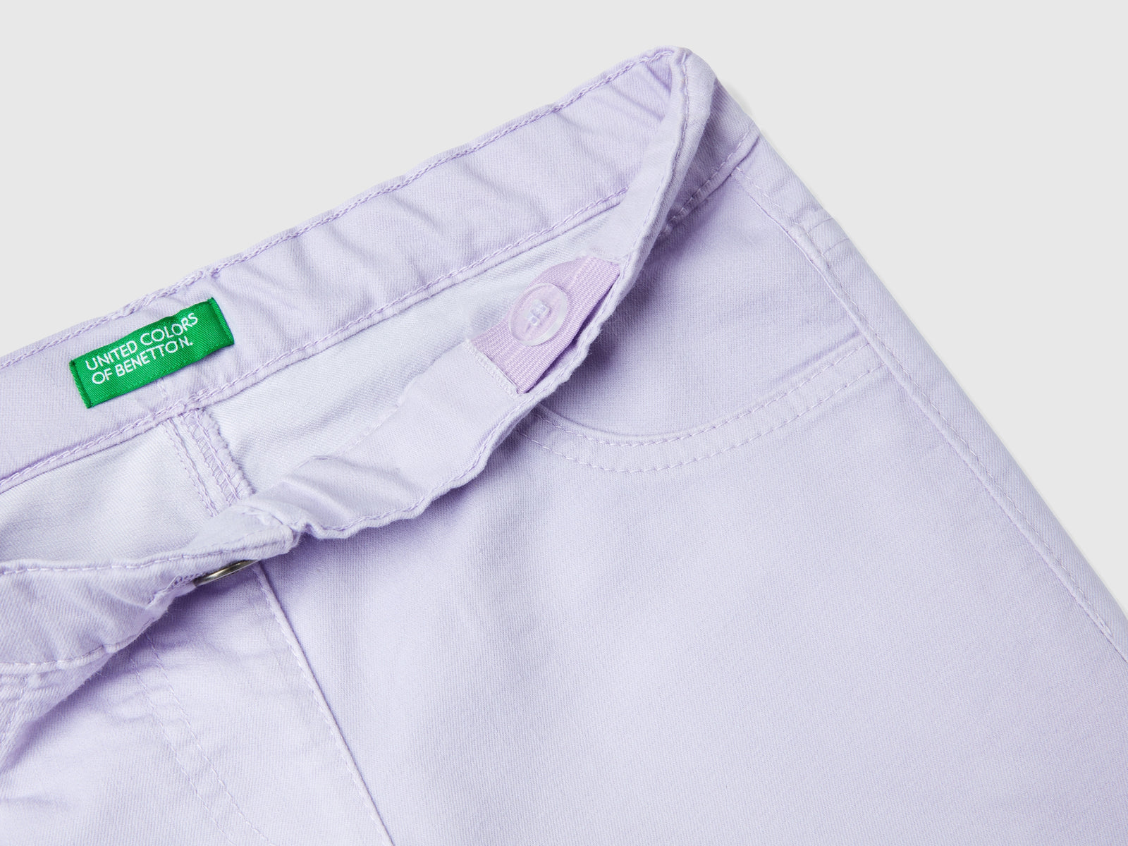 Pantaloni super skinny da bambina lilla 3 | Benetton Outlet