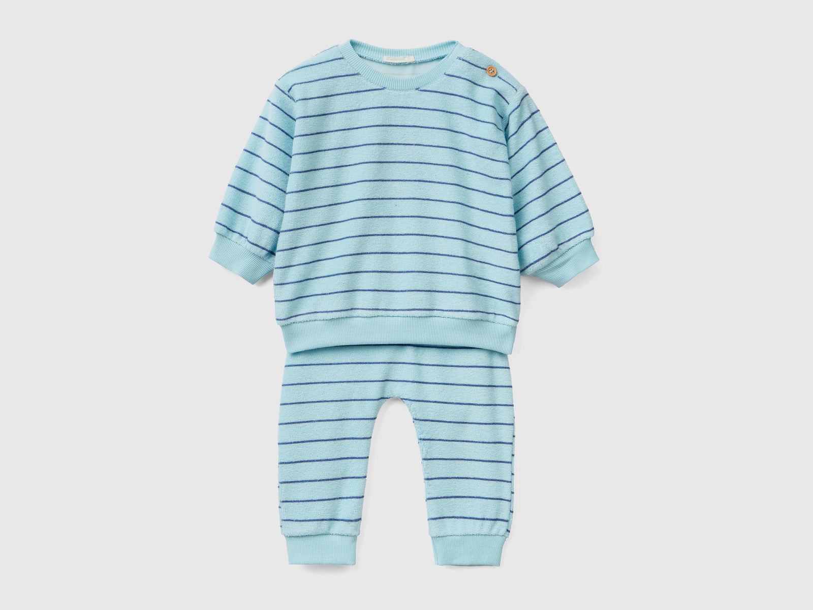 Set maglia e pantaloni in spugna di misto cotone con stampa fantasia da neonato azzurro | Benetton Outlet