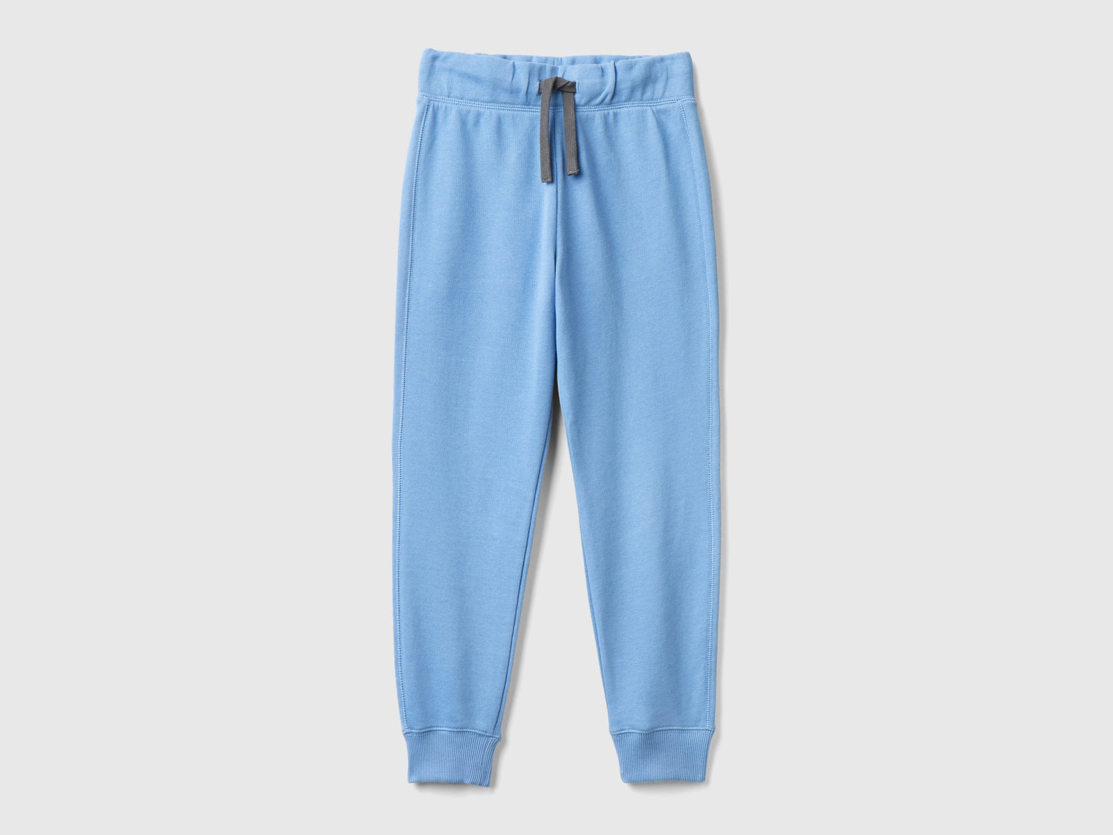 Pantaloni in felpa 100% cotone da bambino azzurro | Benetton Outlet