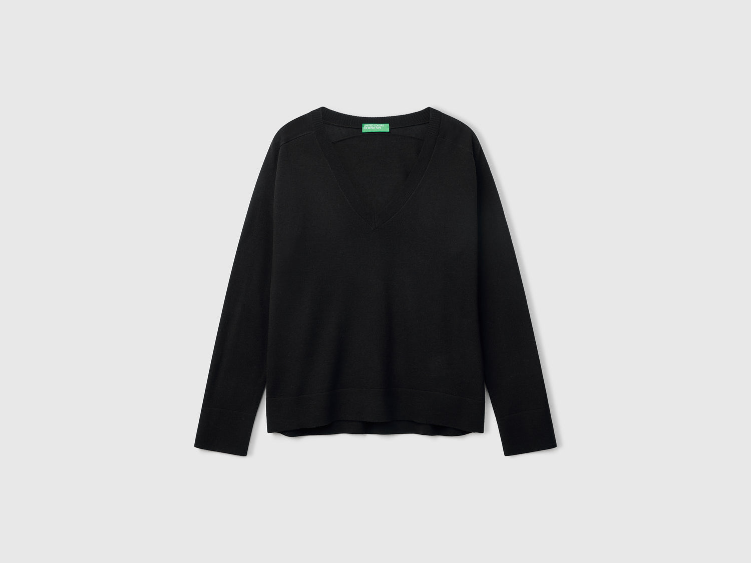 V-neck sweater in pure Merino wool da donna nero | Benetton Outlet