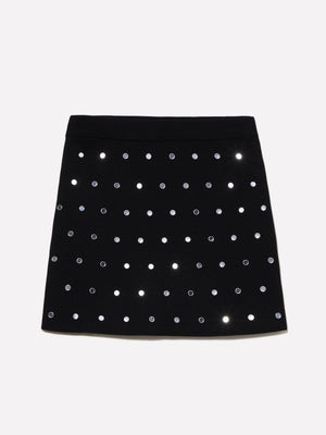 Minigonna in maglia con borchiette