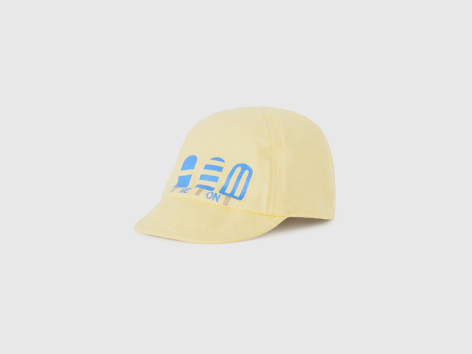 Cappello baseball con stampa da neonato giallo | Benetton Outlet
