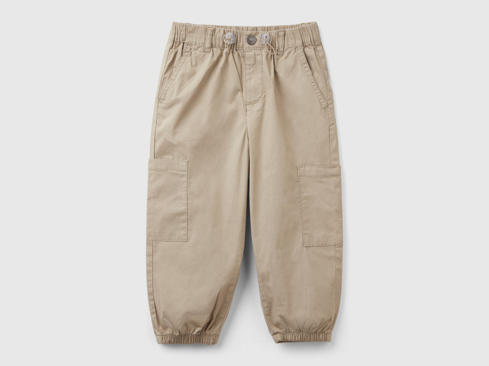 Pantaloni parachute in cotone stretch da bimbo beige | Benetton Outlet