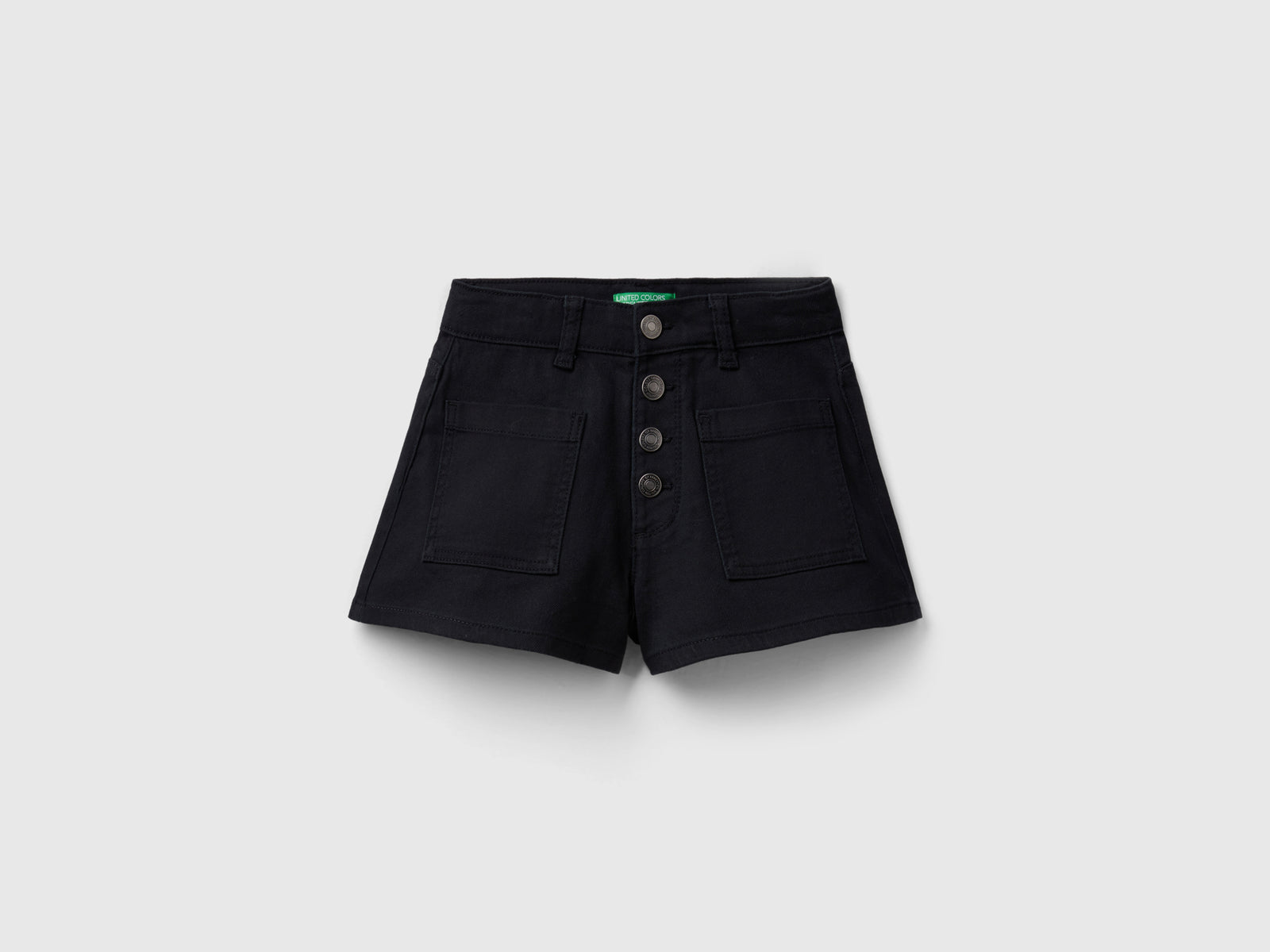 Shorts in cotone stretch da bambina nero | Benetton Outlet