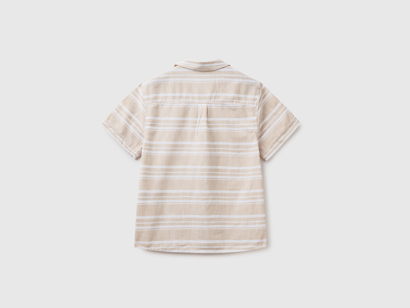 Camicia a manica corta in tela di puro cotone da bambino beige 2 | Benetton Outlet