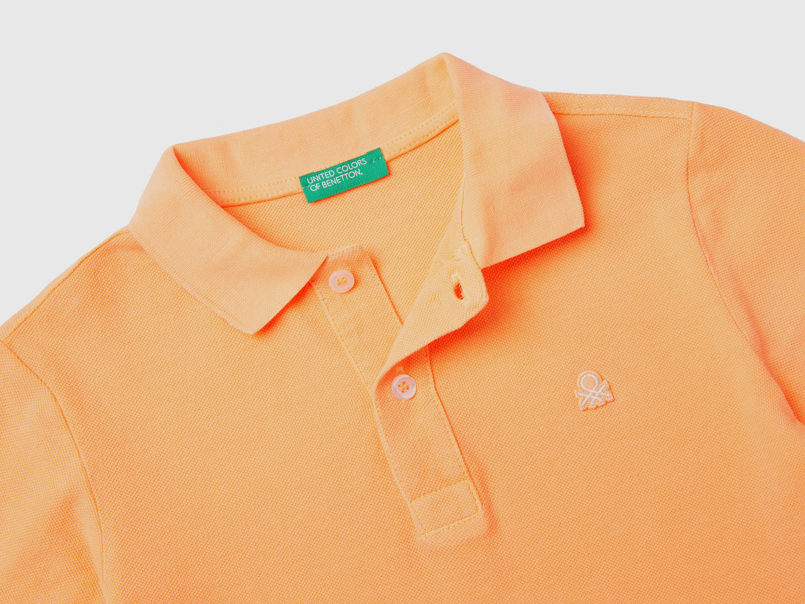 Polo fluo in cotone biologico da bambino arancione fluo 2 | Benetton Outlet