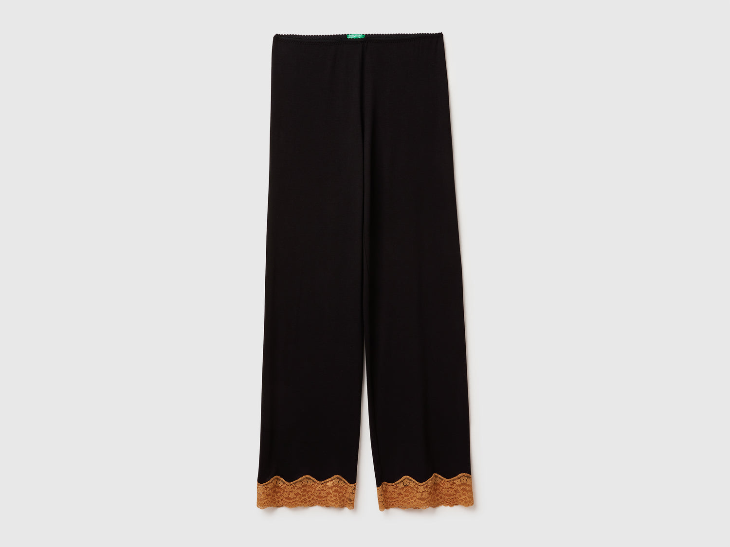Pantaloni fluidi con pizzo da donna nero | Benetton Outlet