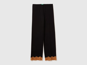 Pantaloni fluidi con pizzo