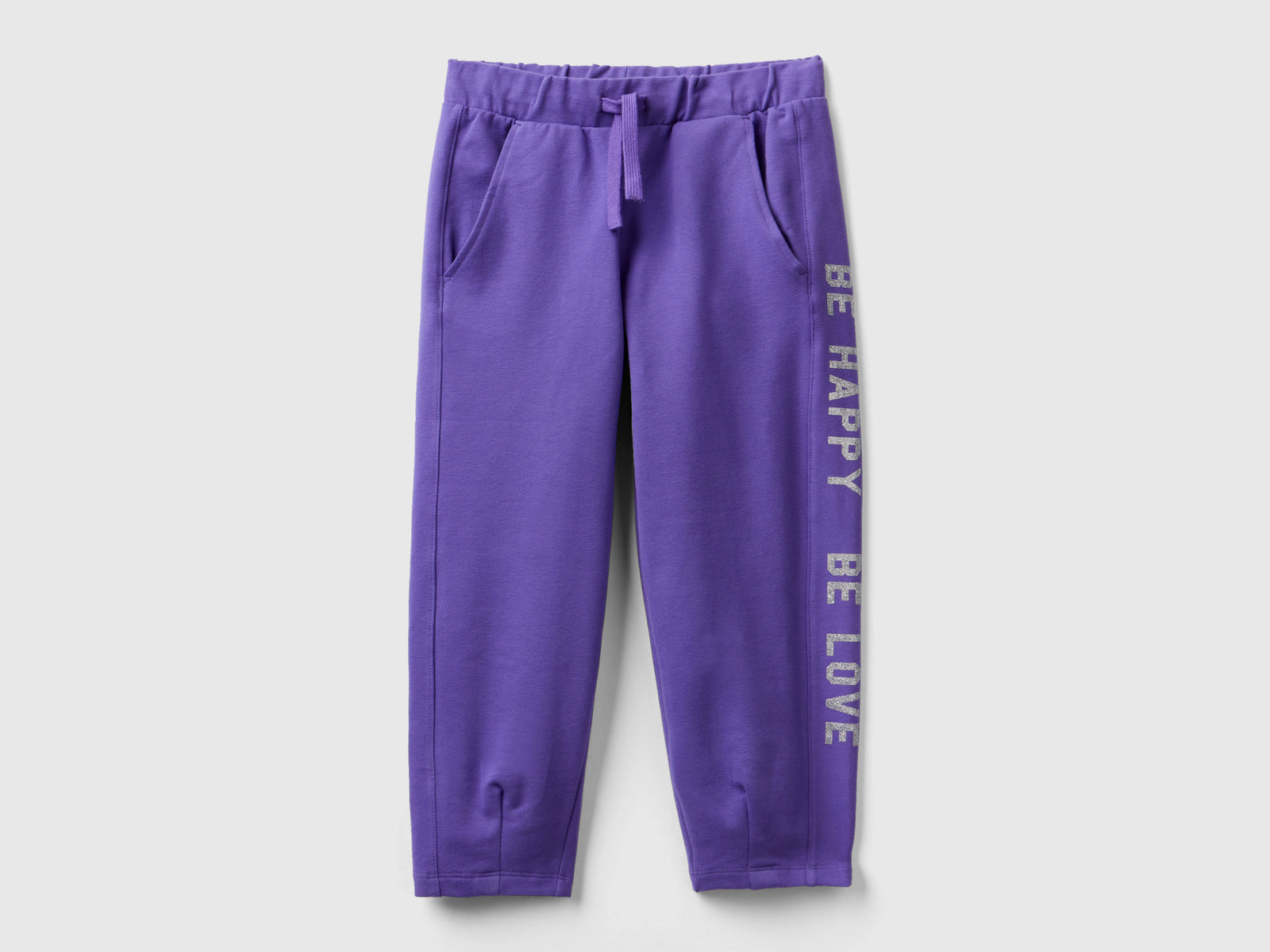 Joggers con stampa glitter da bambina viola | Benetton Outlet